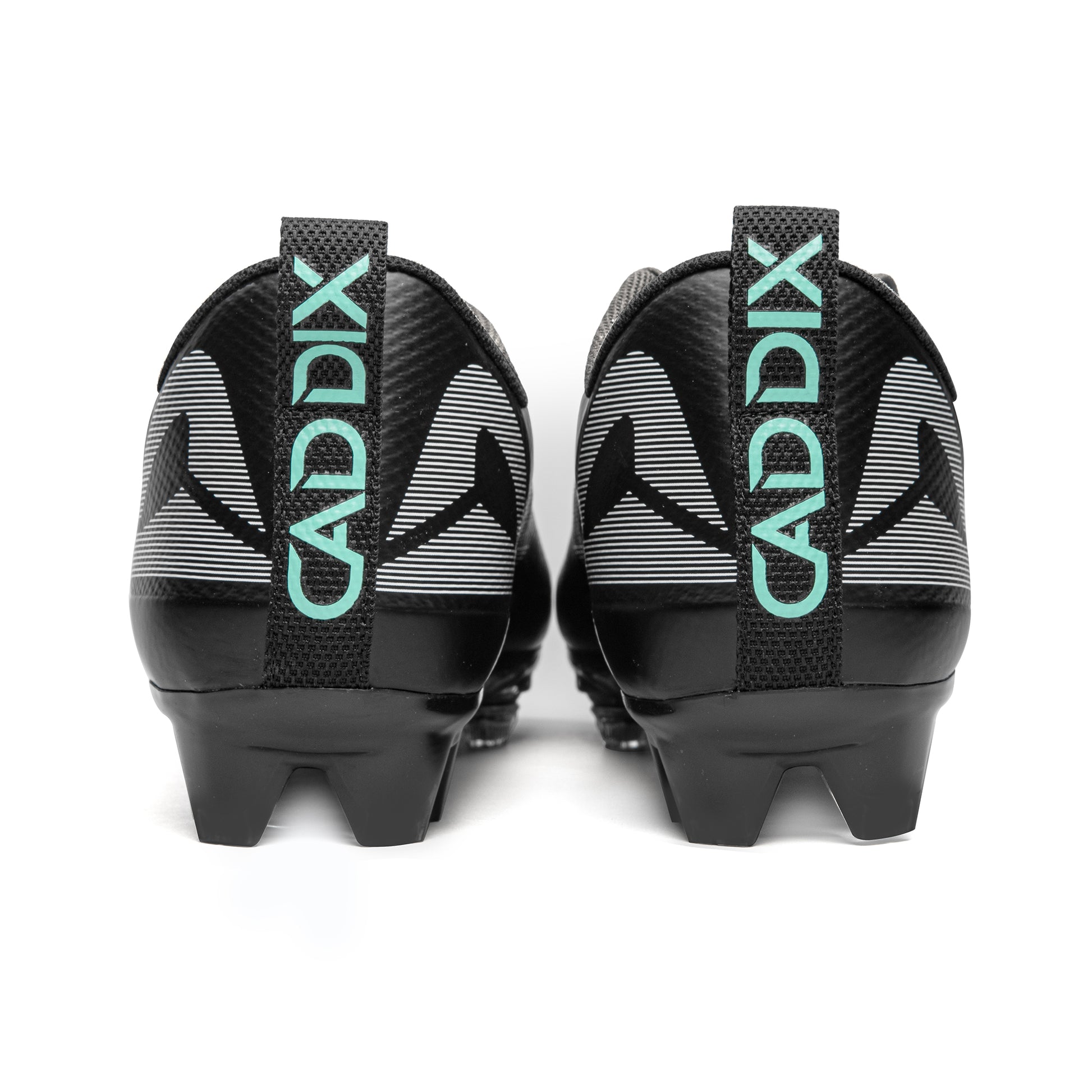Back of pair of low Caddix men’s black/black football and lacrosse cleats that can reduce injuries with patented Smart Studs that flex to minimize stress