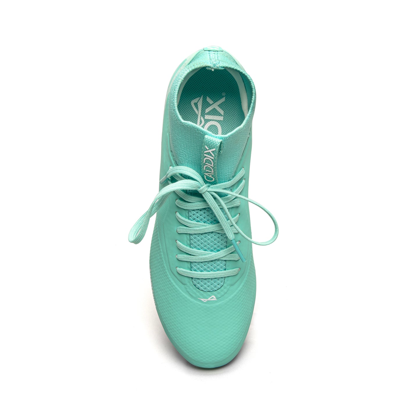 Photo of teal/white Caddix mid women’s soccer and lacrosse cleats from above, used by elite athletes to reduce ACL tears thanks to patented Smart Studs