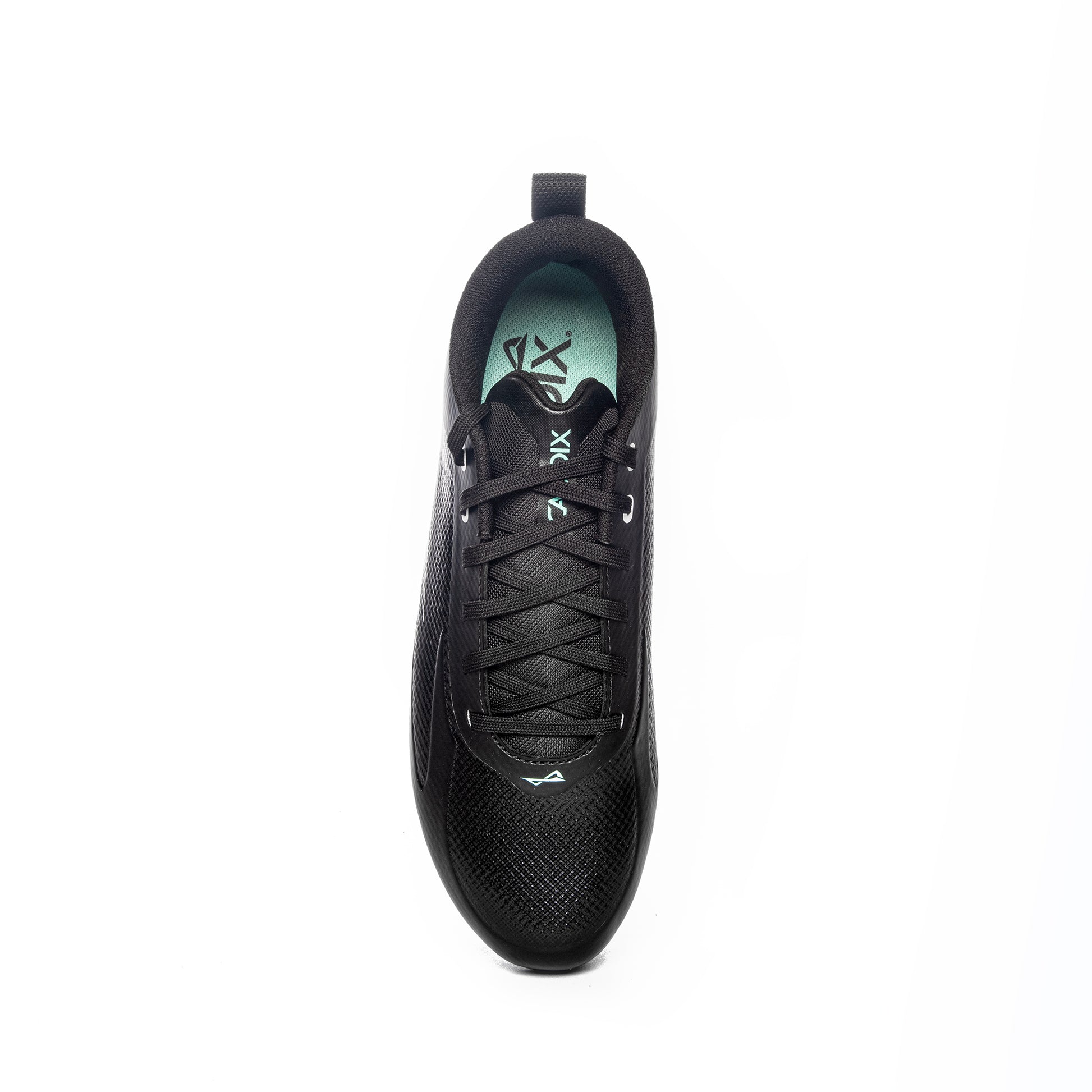 Top-down view of Caddix men’s low black/white football and lacrosse cleats that reduce ACL-tears and ankle injuries with patented Smart Studs technology