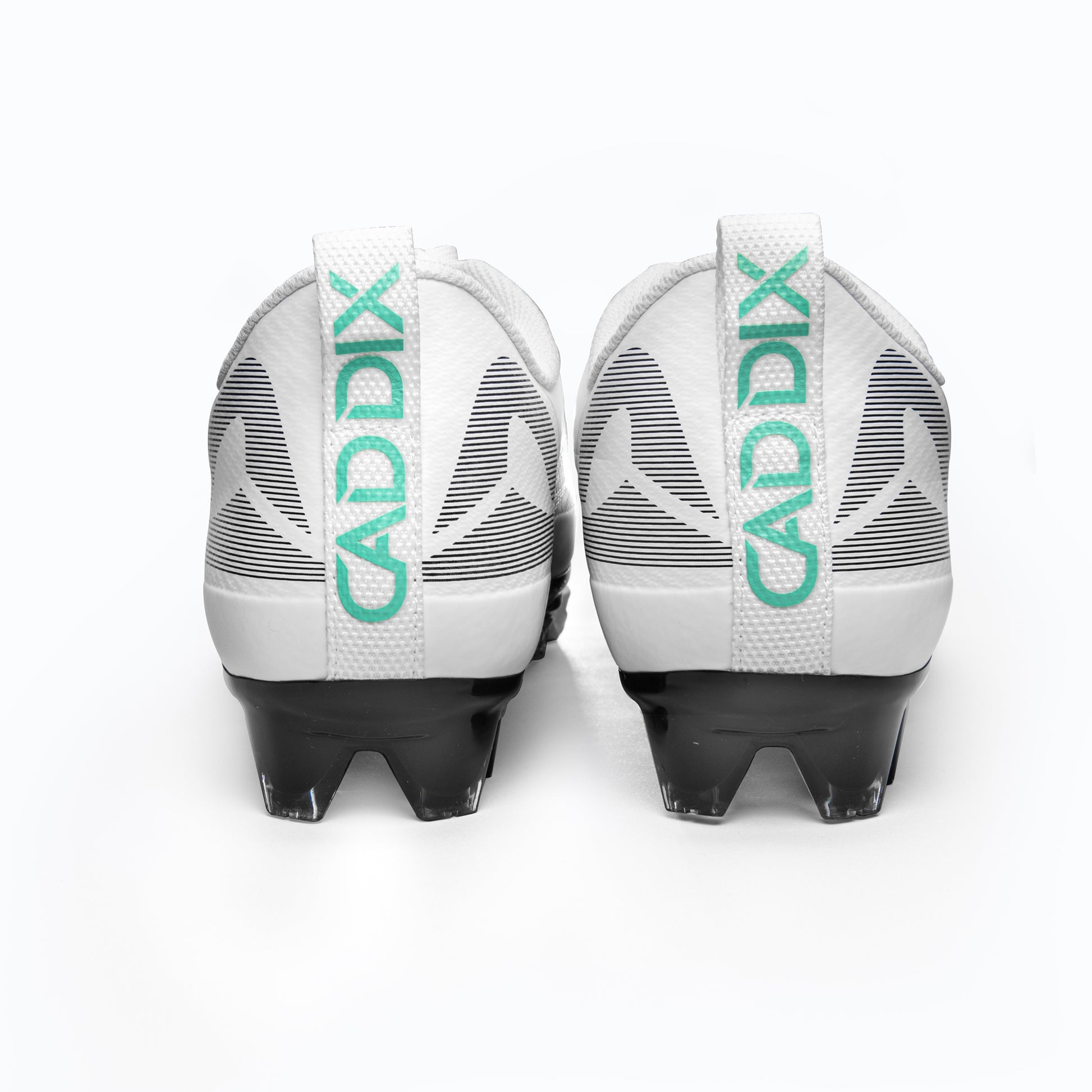 Rear view of Caddix men’s white/black low football and lacrosse cleats with injury-reducing Smart Studs that twist and flex to reduce lower leg stress