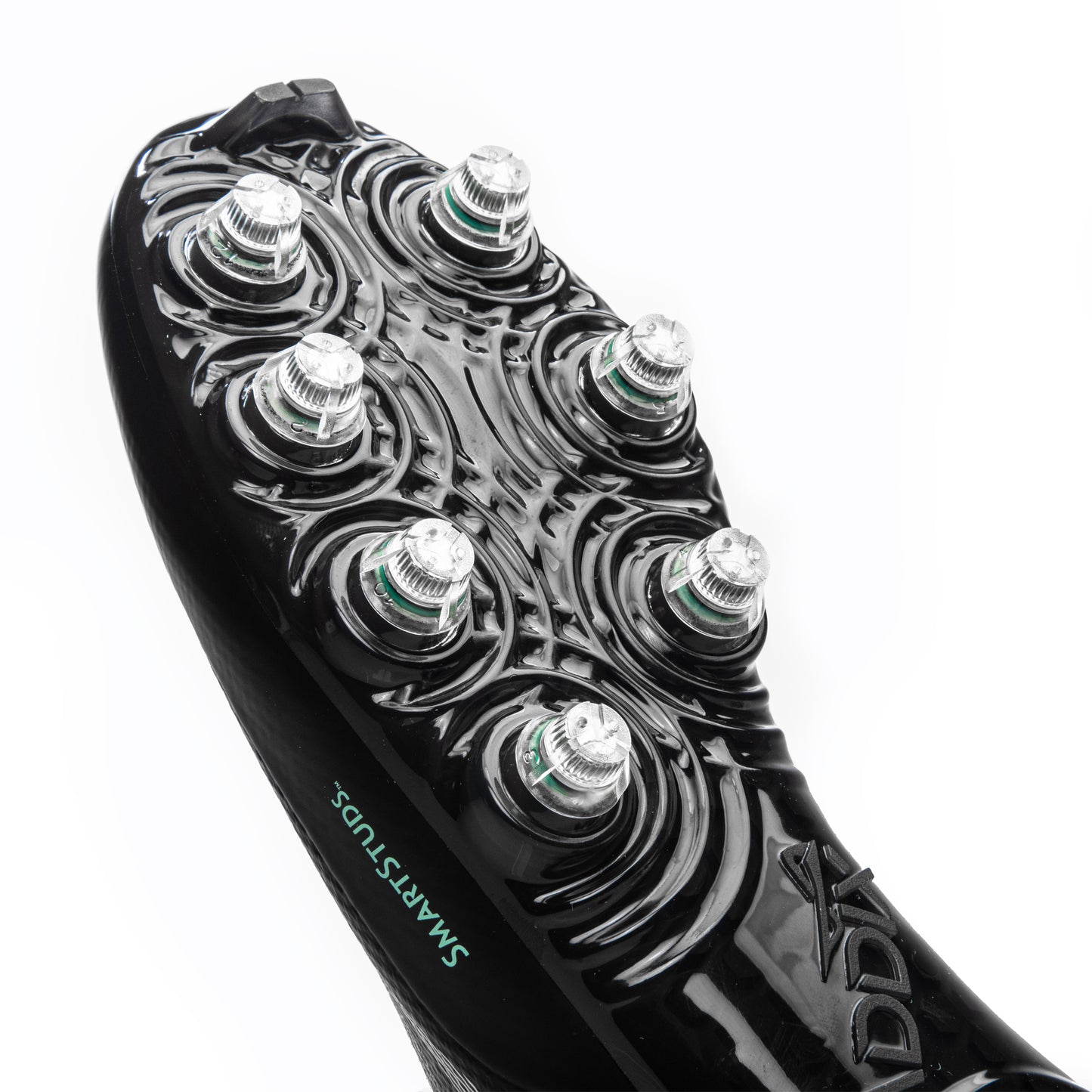 Detailed view of patented, injury-reducing Caddix Smart Studs on men’s low black/black football and lacrosse cleats.