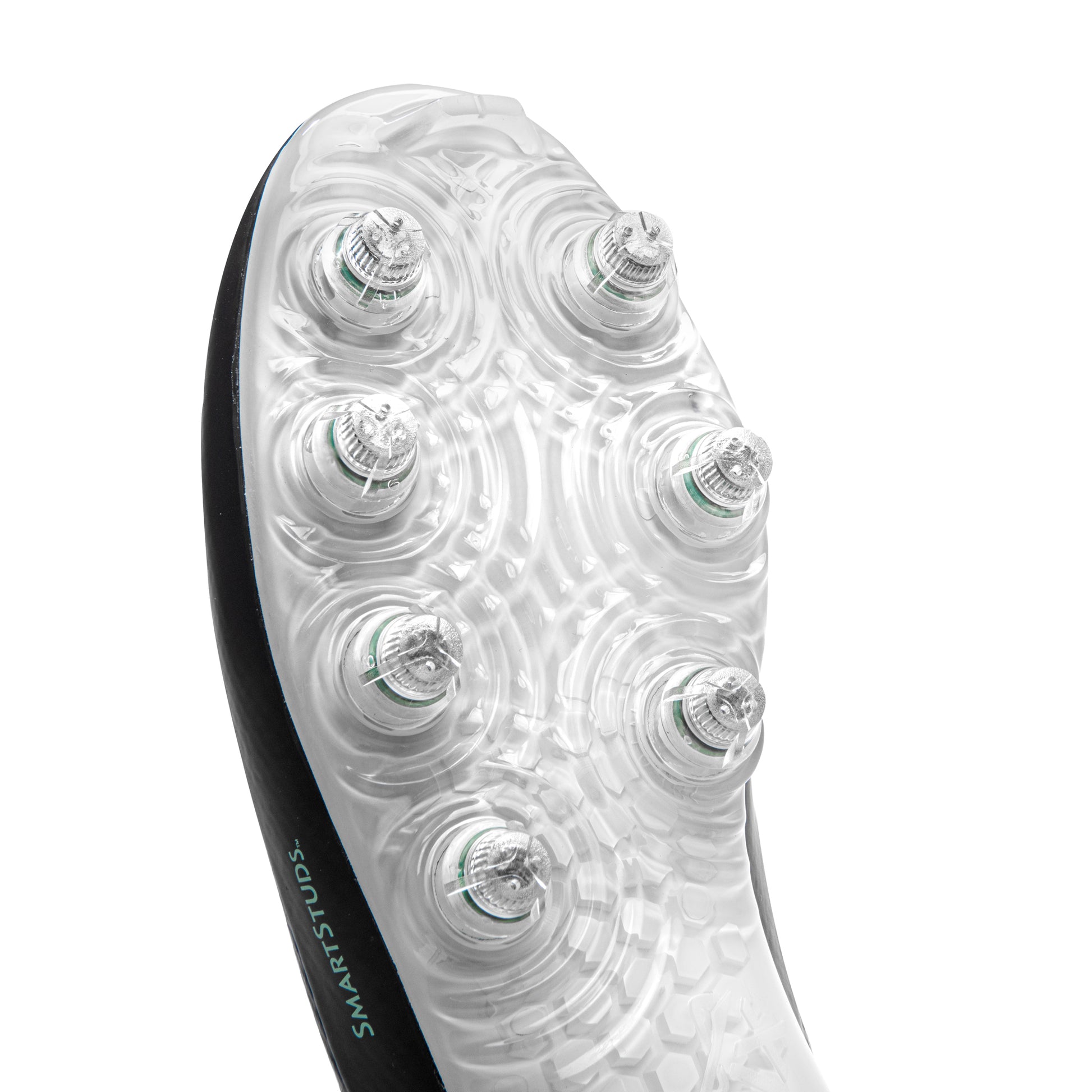 Detailed view of Caddix Smart Studs on men’s low black/white football and lacrosse cleats. Patented Smart Studs reduce stress that causes non-contact ACL tears