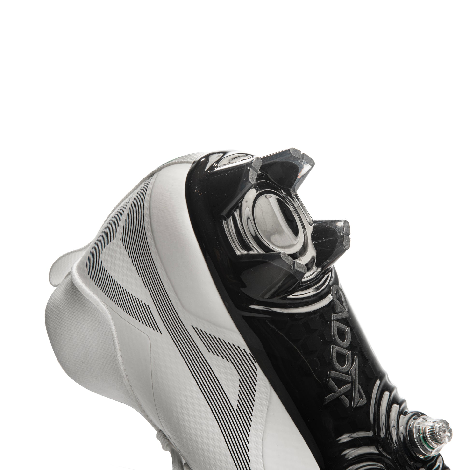 Caddix 4-blade heel on its mid men’s white/black football and lacrosse cleats that use patented Smart Studs in front to reduce torque that can cause injuries