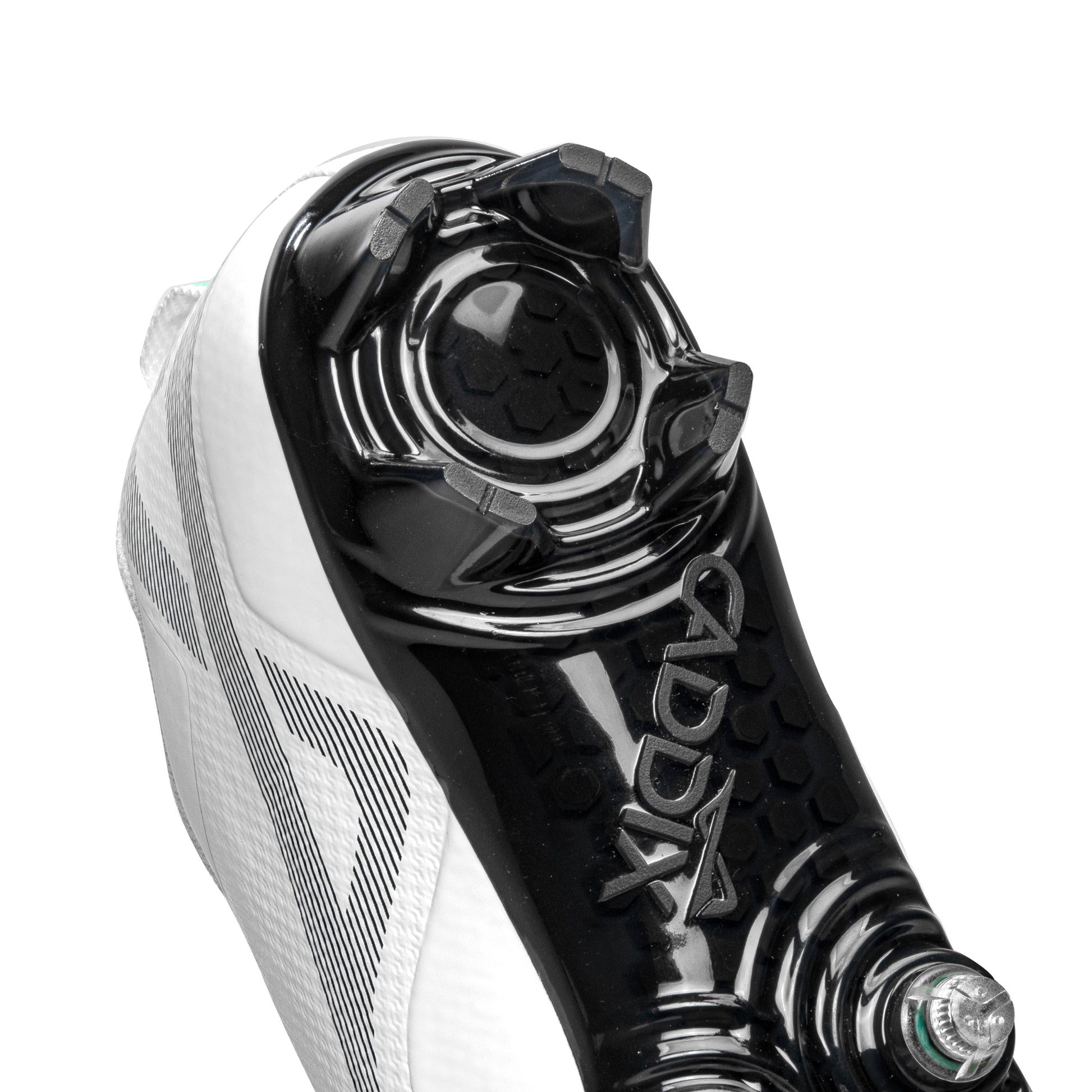 Detail of four-bladed heel design on Caddix men’s football and lacrosse low white/black cleats