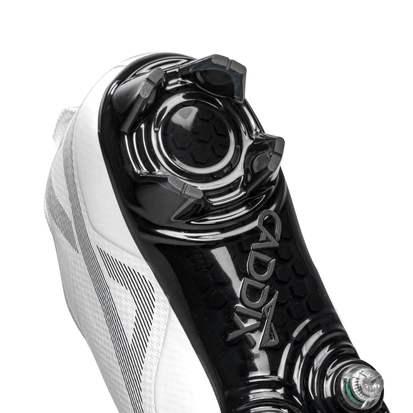 Detail of four-bladed heel design on Caddix men’s football and lacrosse low white/black cleats