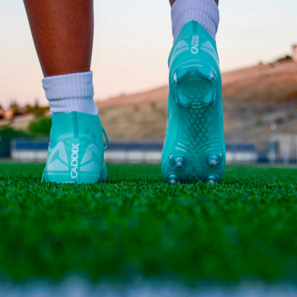 Caddix Teals Mid – ACL Injury-Reducing Cleats for Women