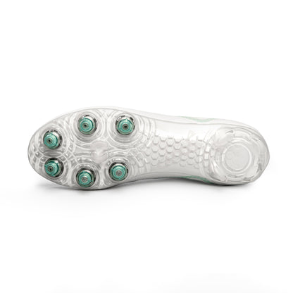 Photo of the bottom of women’s low white/white Caddix soccer and lacrosse cleat showing patented Smart Studs that flex & spin to reduce ACL and ankle injuries