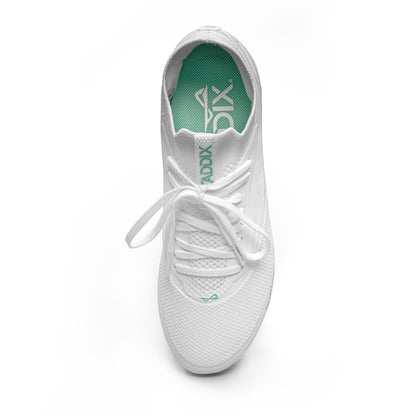 Overhead shot of low white/white Caddix women’s soccer and lacrosse cleats, featuring patented Smart Studs, used by top athletes to reduce ACL tears