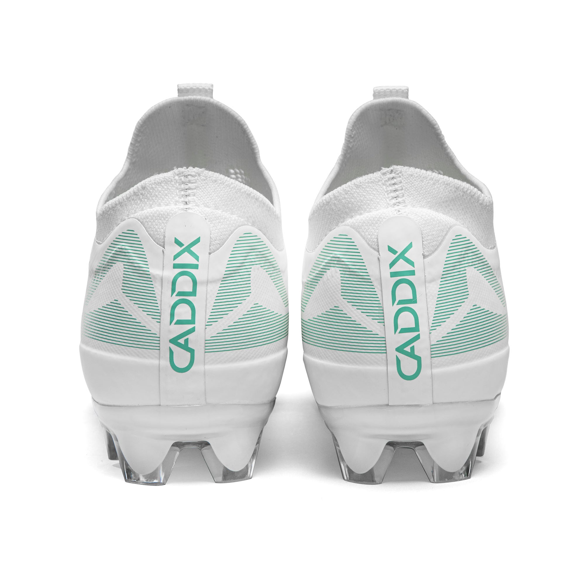 Caddix-branded white/white women’s low cleats used in soccer and lacrosse—-with patented Smart Studs that minimize injuries other cleats cause